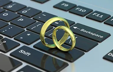 Wedding rings on a keyboard